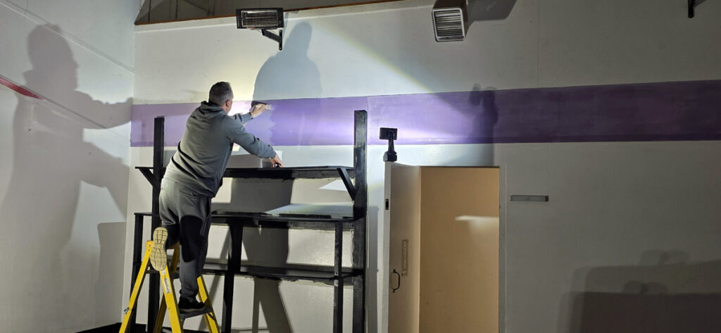 Dave Ling painting the Fit 4 Ever studio